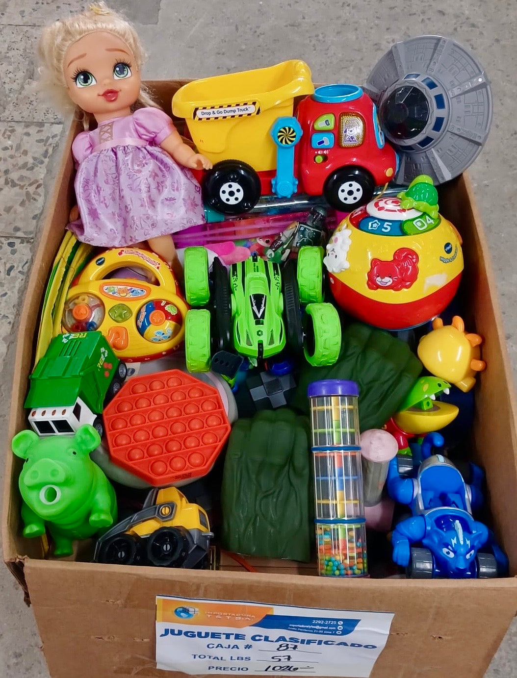 Caja #87 juguete clasificado americano usado
